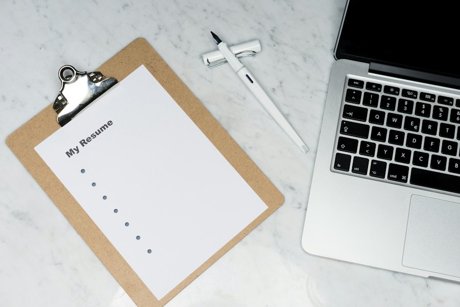 Canadian small business owner reviewing tax documents and forms with pen